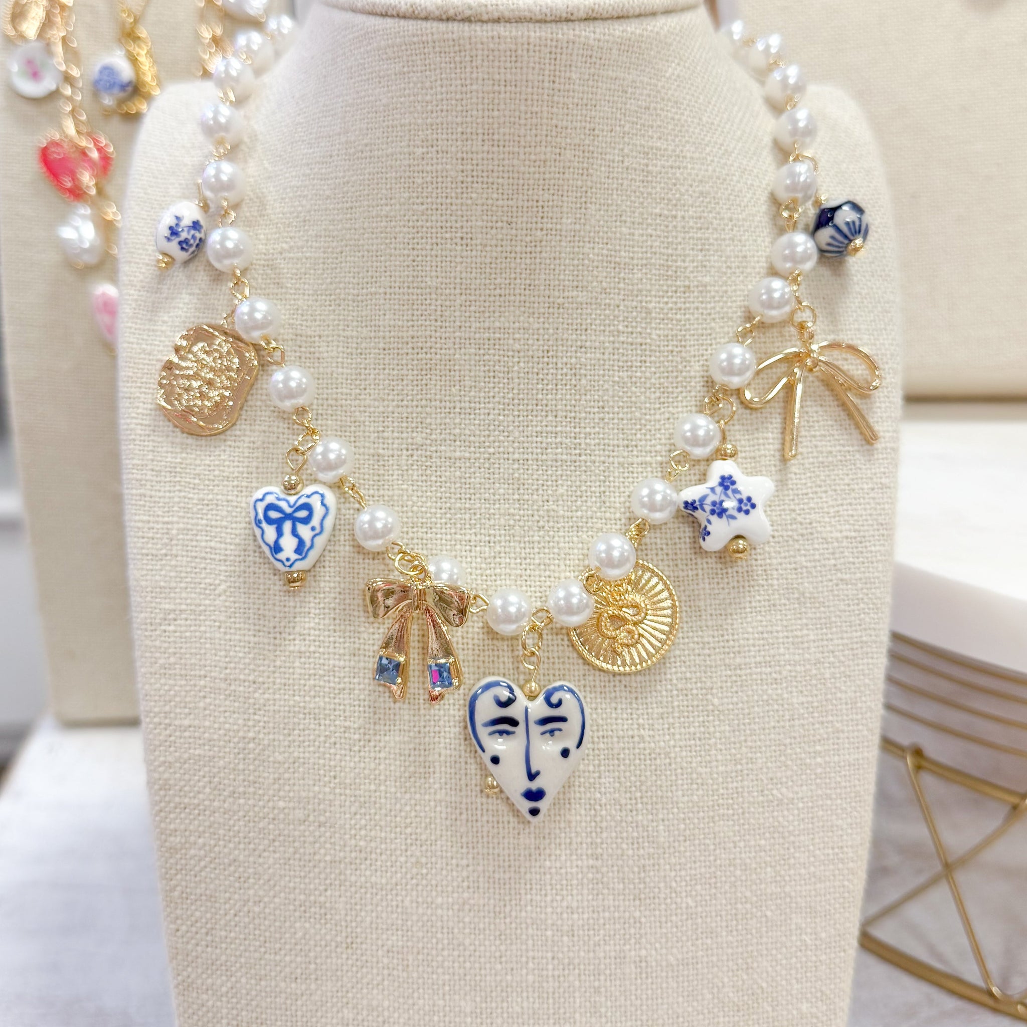 Blue & Bows Pearl Chain Charm Necklace