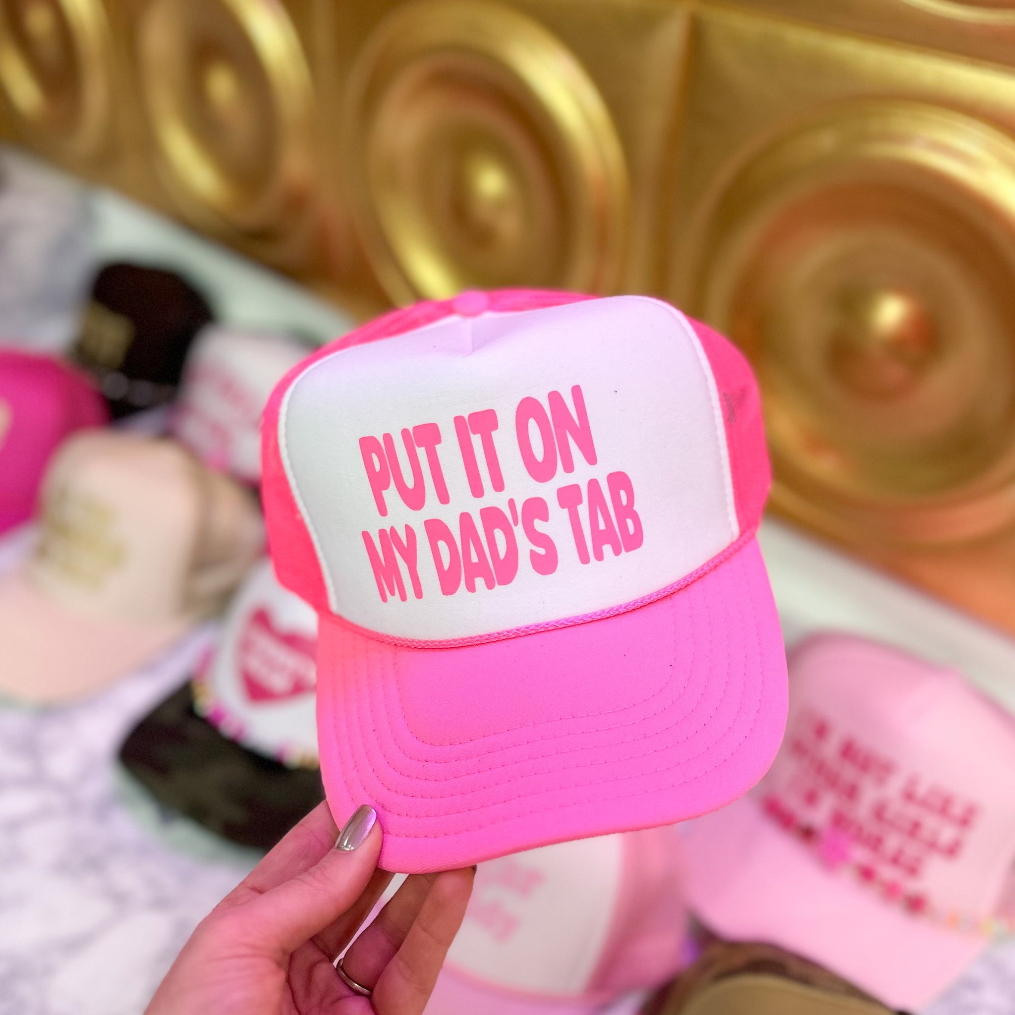 Put It On My Dad's Tab Trucker Hat