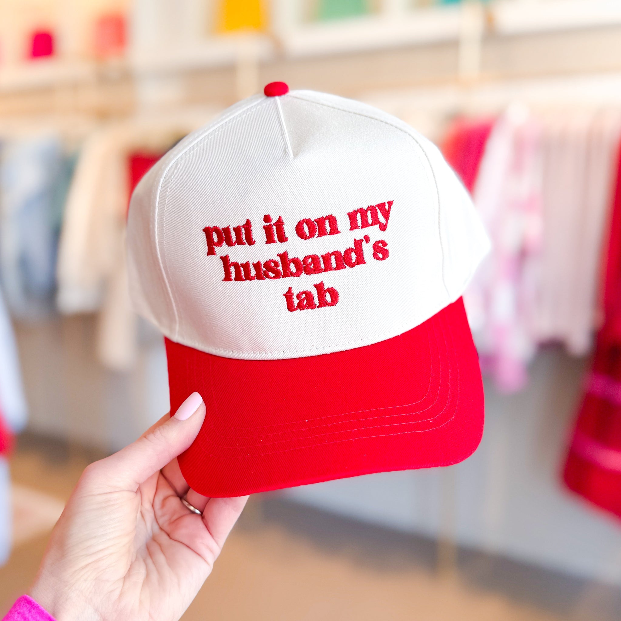 Red Put It On My Husbands Tab Embroidered Trucker Hat
